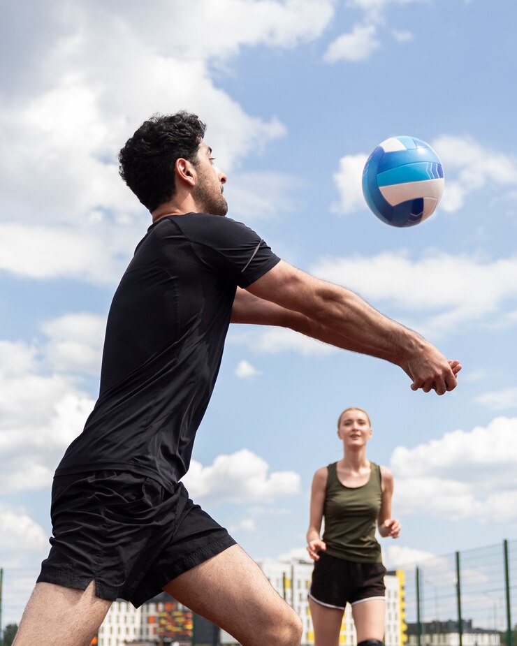 young-volleyball-man-player-court_23-2149492349